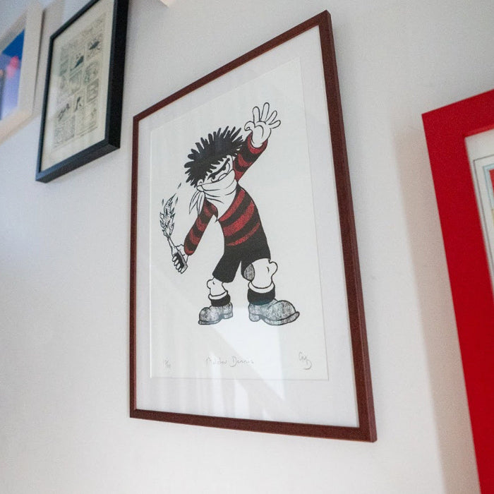 Framed screenprint featuring masked  Dennis figure – Molotov Dennis by Bravespears