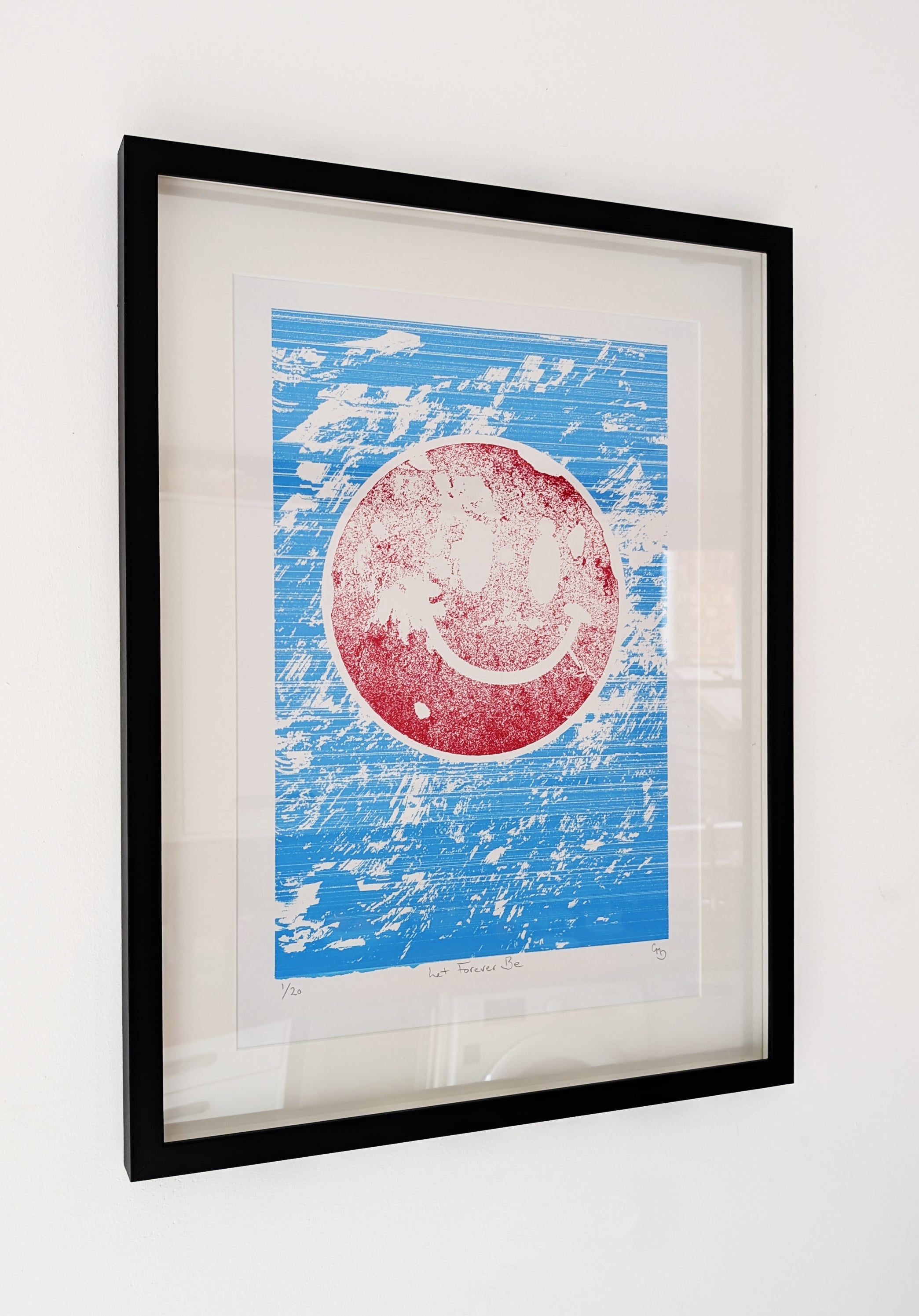 Let Forever Be framed screen print – red smiley artwork in black frame, by Gerard McDonagh