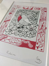 Load image into Gallery viewer, Discover the beauty of nature captured in our limited edition Robin illustration print by Gerard McDonagh/Bravespear, crafted at Print Club in Dalston, East London. With its striking red splash and intricate botanical backdrop, this artwork symbolizes renewal and vitality. Whether matted and ready to frame or already framed, this piece brings a touch of East London creativity into your home.