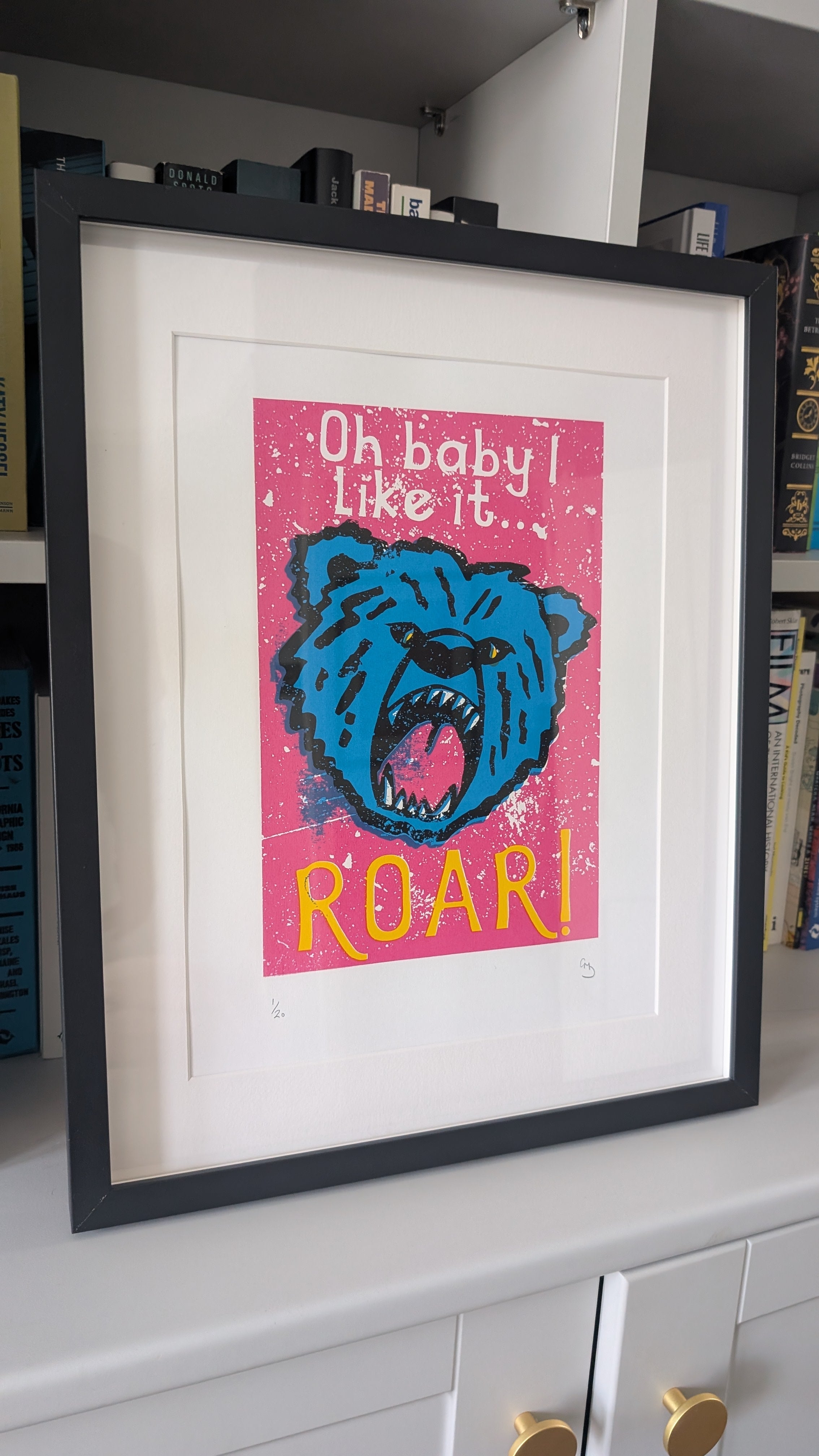Bold collectible artwork Roar by Gerard McDonagh – pink, blue, and yellow pop art screen print

Roar screen print by Gerard McDonagh – limited edition pop art with text overlay