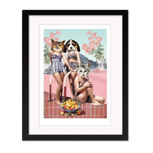 Framed artwork of animals in swimsuits on a beach with a black frame.