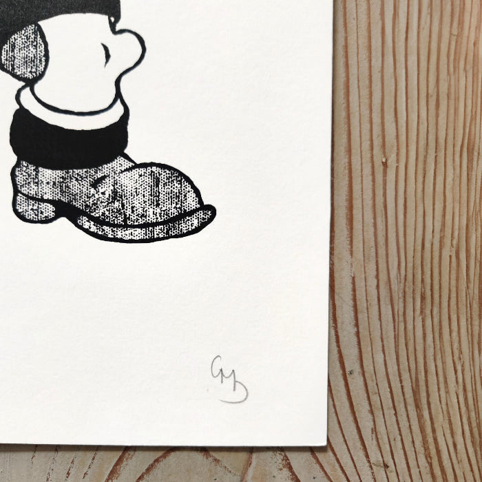 Detail of Molotov Dennis by Gerard McDonagh, showing the printed boots and pencil signature on white paper.